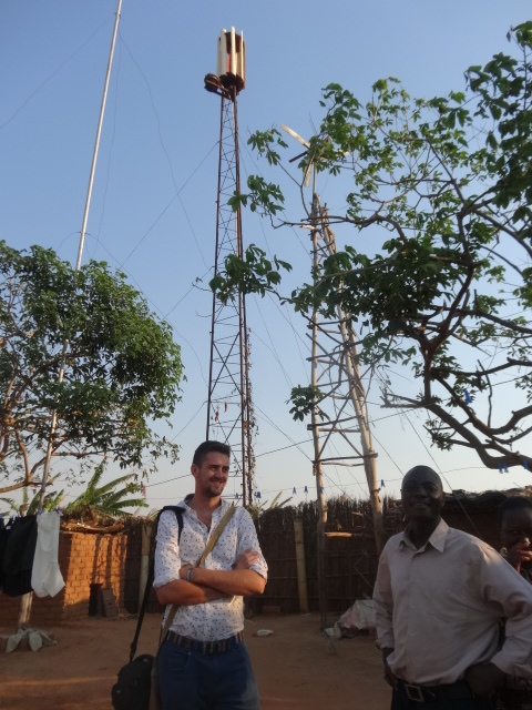 Pádraic MacOireachtaigh with Mr Zawanda, a teacher from Kasungu in front of the new windmills.